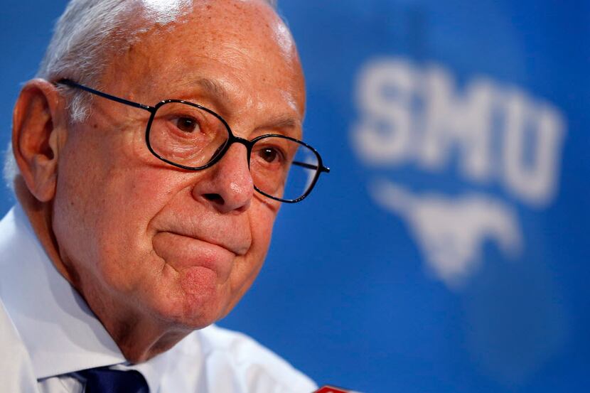 SMU Mustangs head coach Larry Brown discusses the game during the post game press conference...