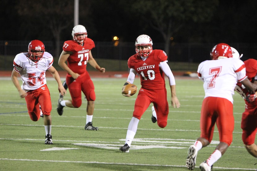 Creekview's David Blough (10) carries the ball against Terrell Nov. 2. The Mustangs won...