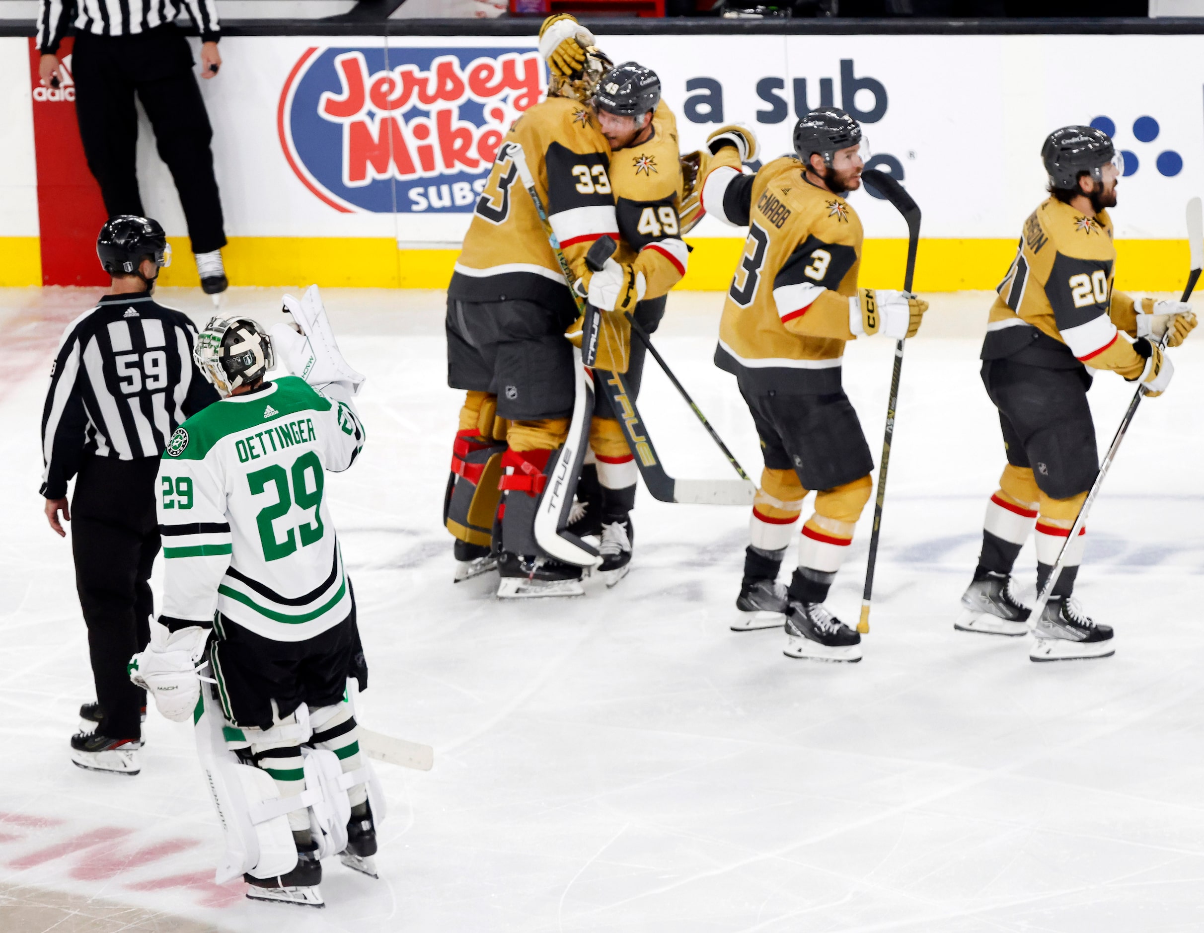 Dallas Stars goaltender Jake Oettinger (29) skates to the bench as the Vegas Golden Knights...