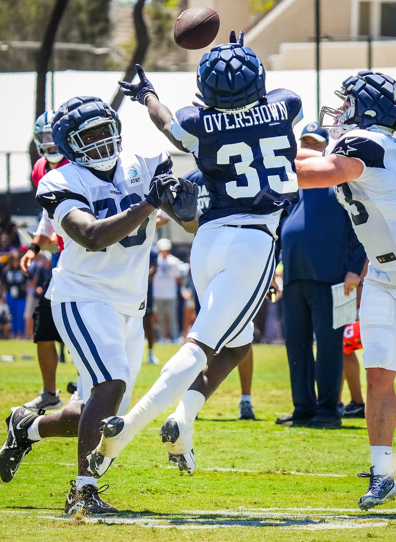 Dallas Cowboys linebacker DeMarvion Overshown (35) reaches to intercept a pass intended for...