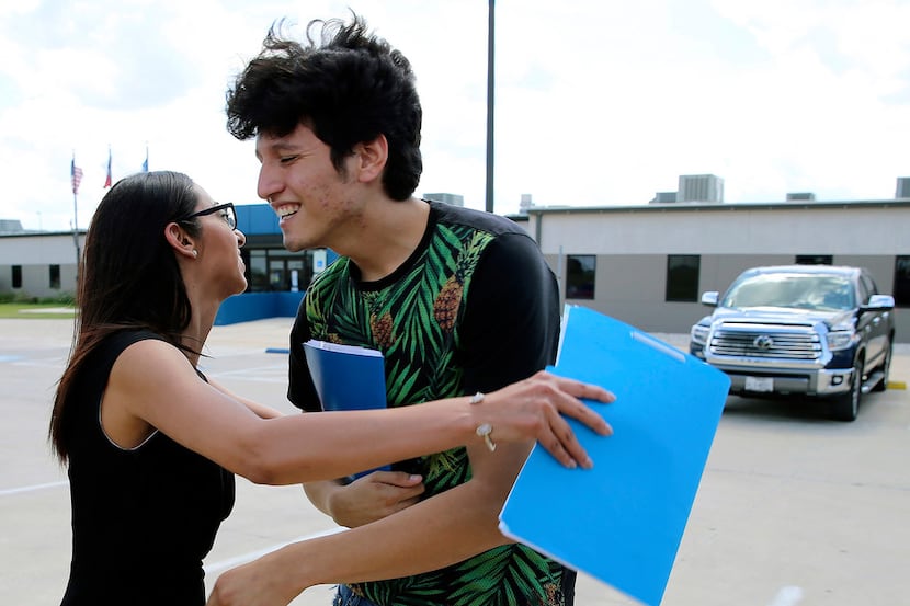 Francisco Galicia, 18, got a hug from his attorney, Claudia Galan, after his release from...