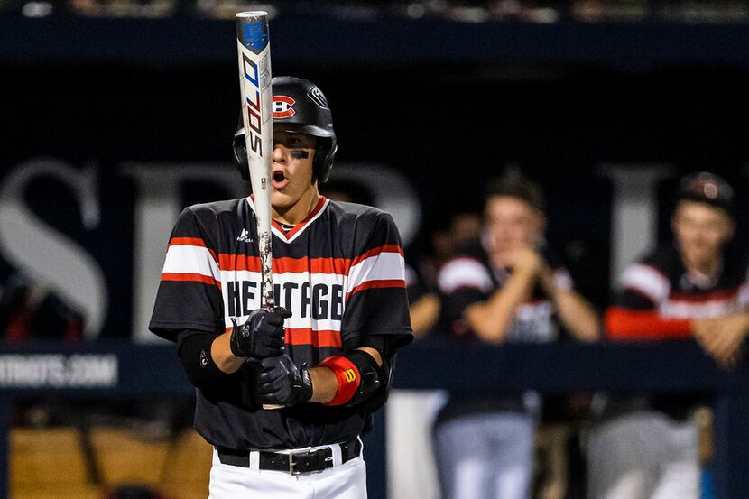 Colleyville Heritage shortstop Bobby Witt Jr. steps into the batters box during game one of...