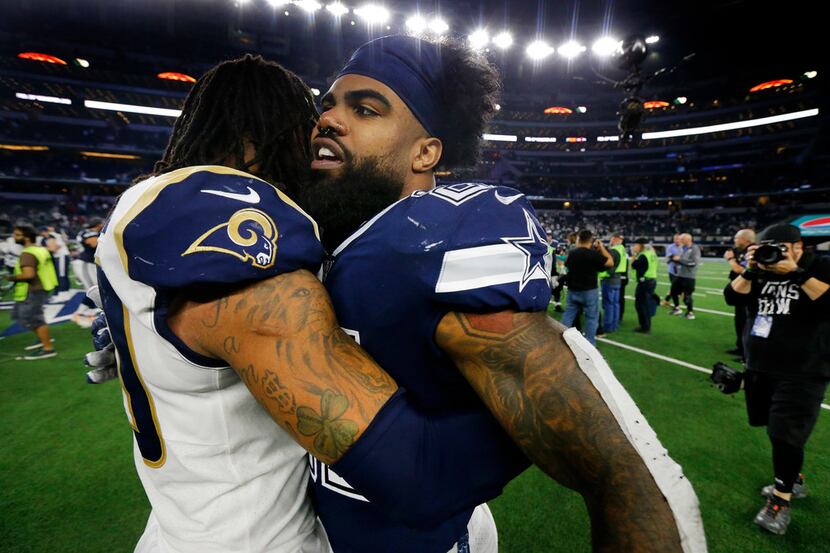 Los Angeles Rams running back Todd Gurley (30) congratulates Dallas Cowboys running back...