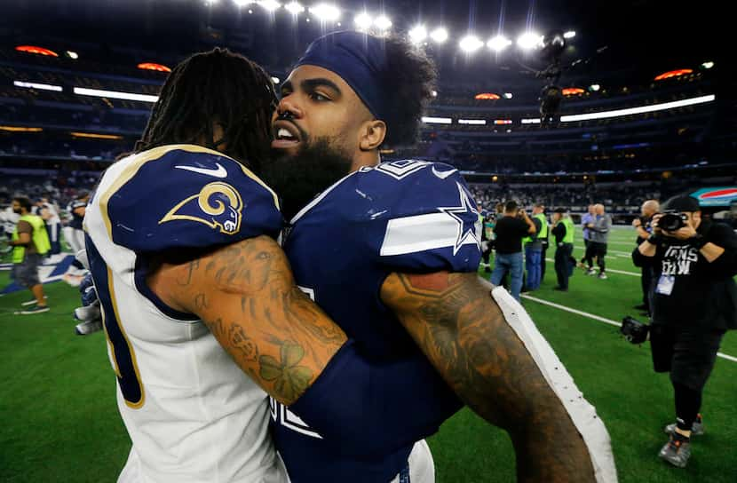 Los Angeles Rams running back Todd Gurley (30) congratulates Dallas Cowboys running back...