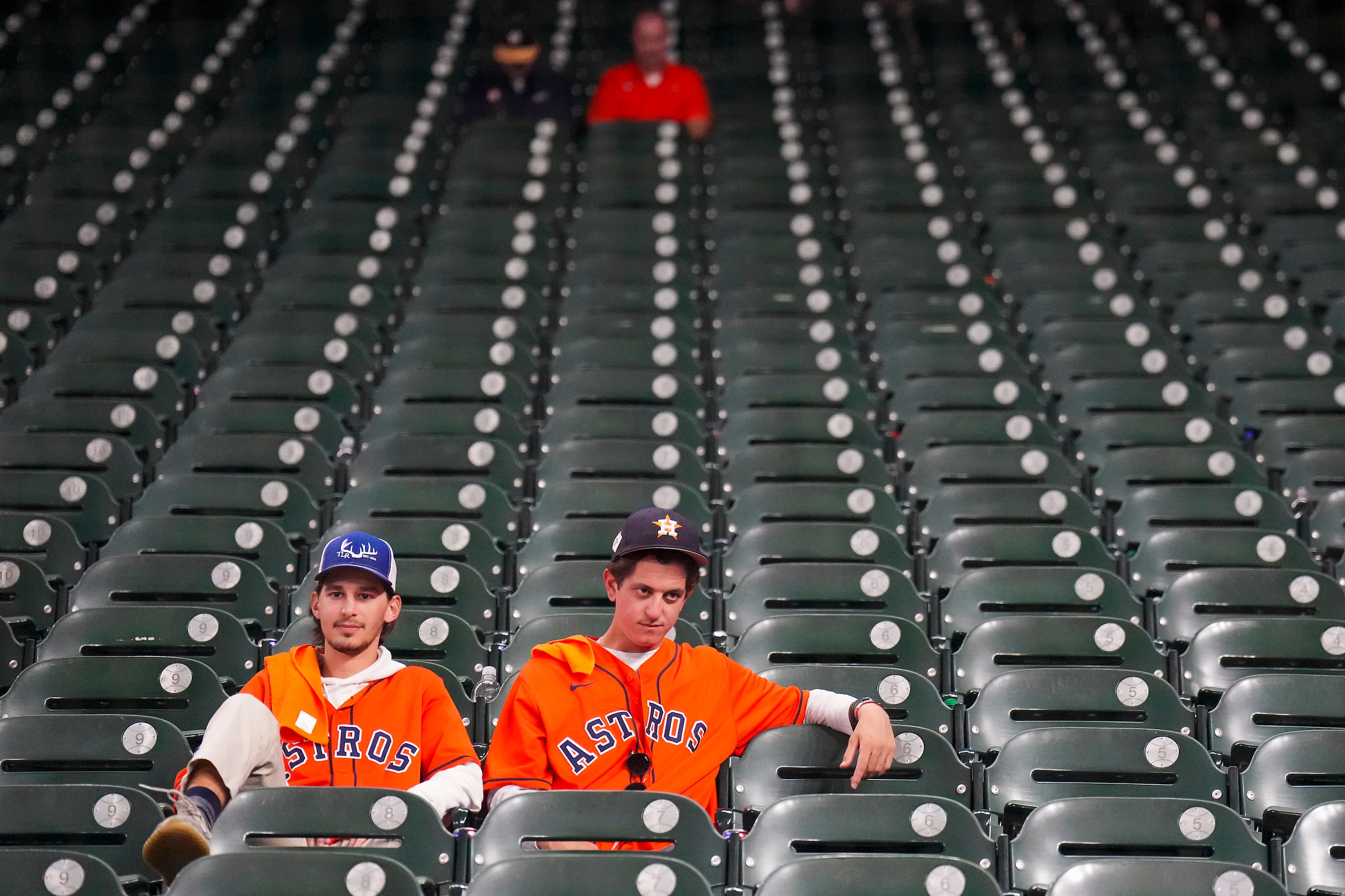 Houston Astros fans sit in the seats after a 5-4 Texas Rangers victory in Game 2 of the...