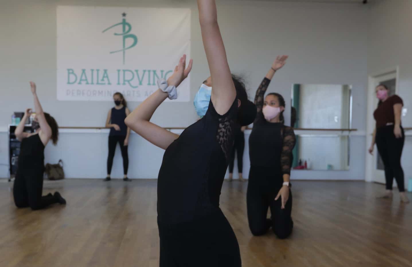Students practice during a jazz class at Baila Irving Performing Arts Academy in Irving, TX,...