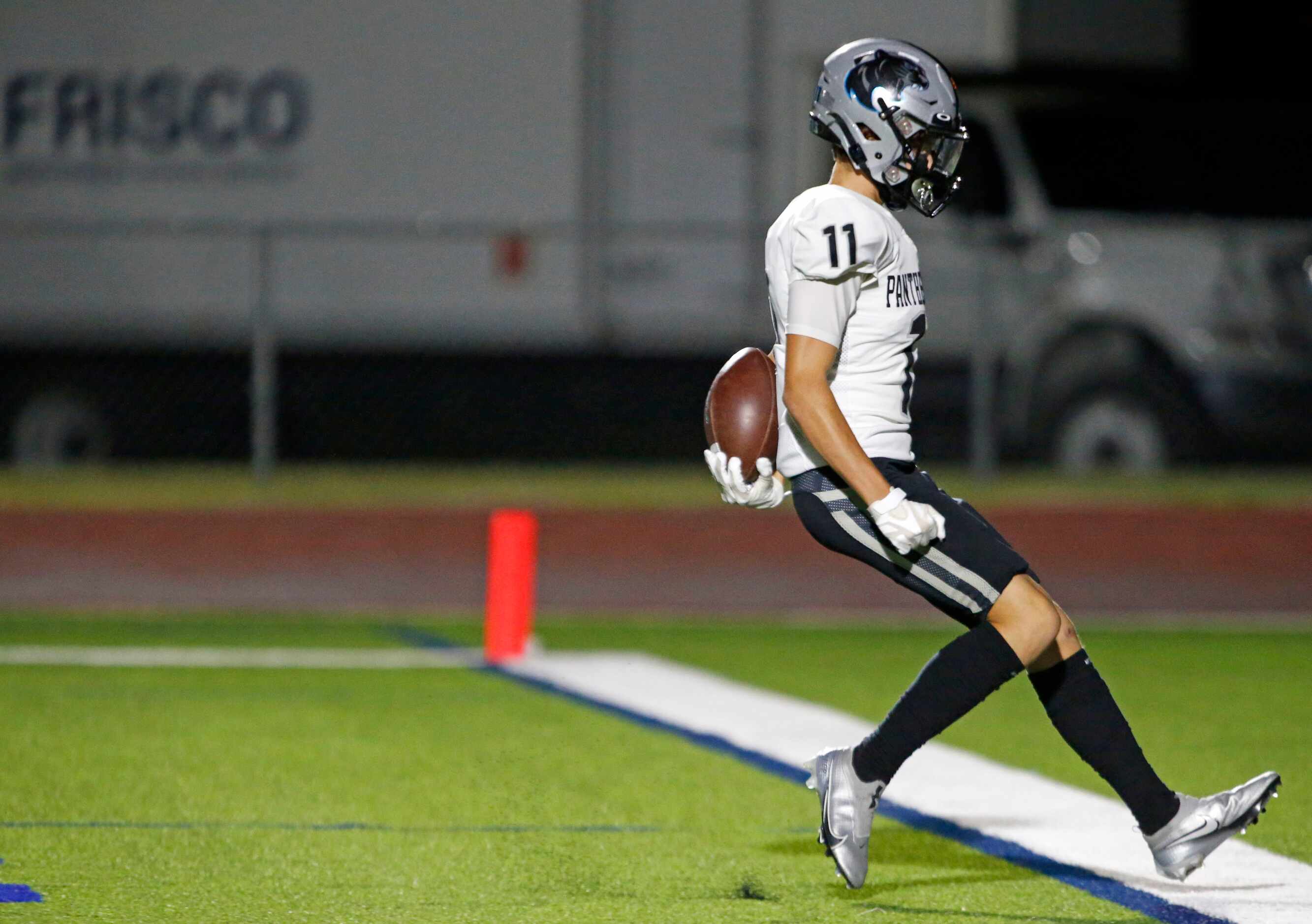 Frisco Panther Creek High’s Cristian Trickett (11) takes the football into the end zone for...