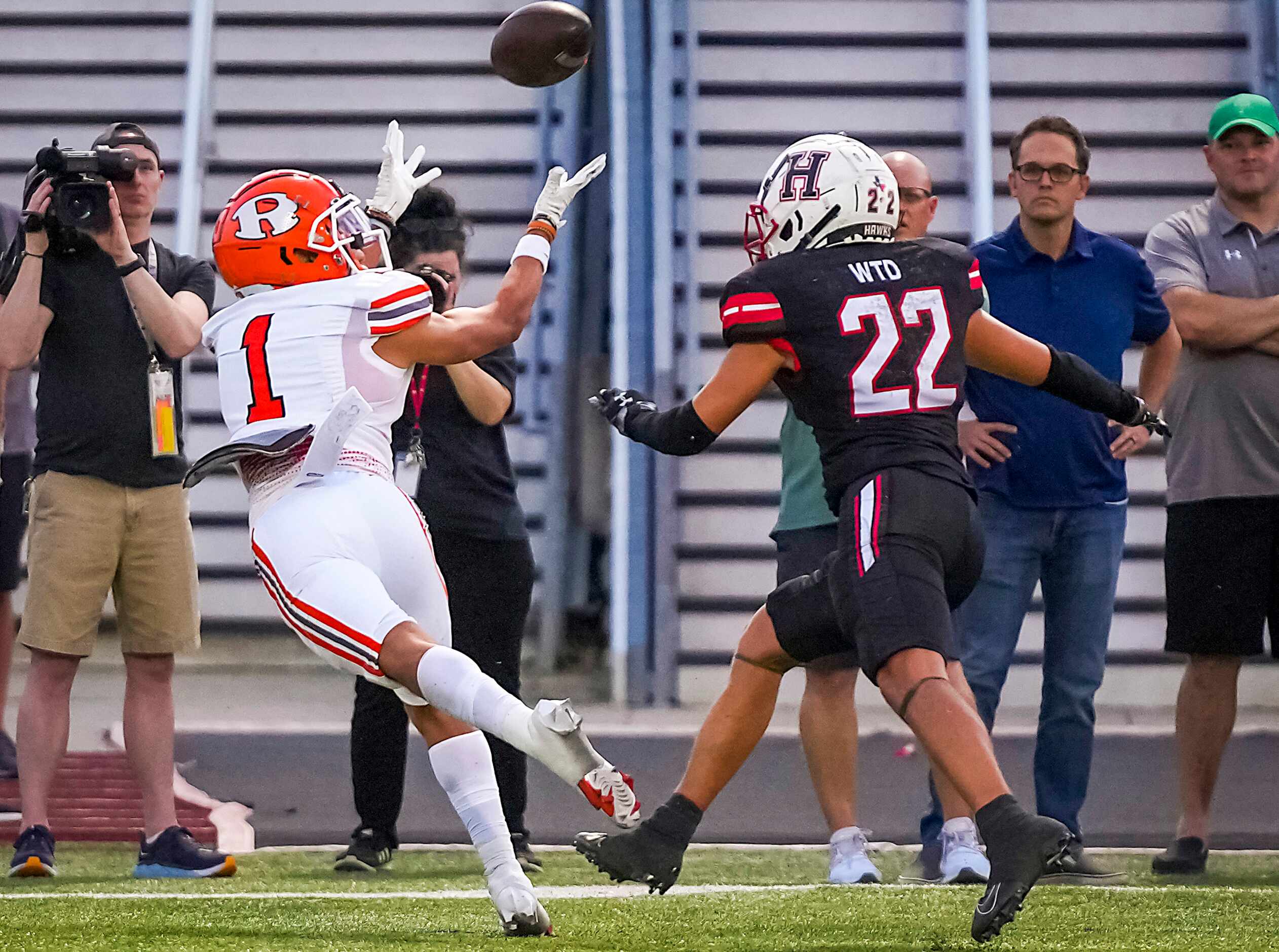 Rockwall wide receiver Aiden Meeks (1) hauls in a touchdown pass as Rockwall-Heath defensive...