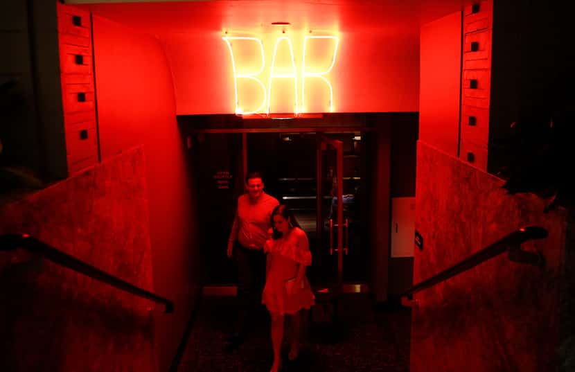 Anthony and Stefani Ferlan exit  Bourbon & Banter speakeasy inside The Statler Hotel in...