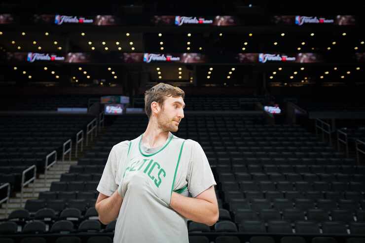 Boston Celtics center Luke Kornet takes the floor for a team practice in preparation for...