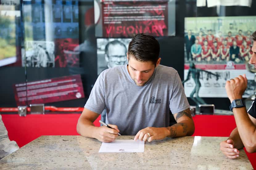 Ryan Hollingshead signs his new contract with FC Dallas. (9-16-19)