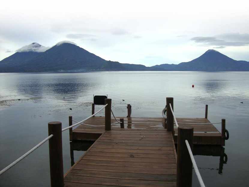 Visitors get a  picture-postcard view of serene Lake Atitlán from a dock near Casa Palopó.