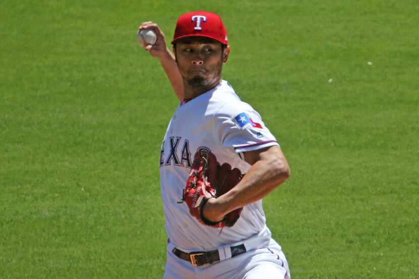 Texas Rangers starting pitcher Yu Darvish (11) pitches during the Kansas City Royals vs. the...