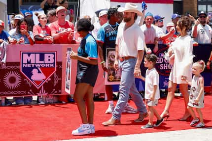 Philadelphia Phillies first baseman Bryce Harper walks with his family during the MLB...