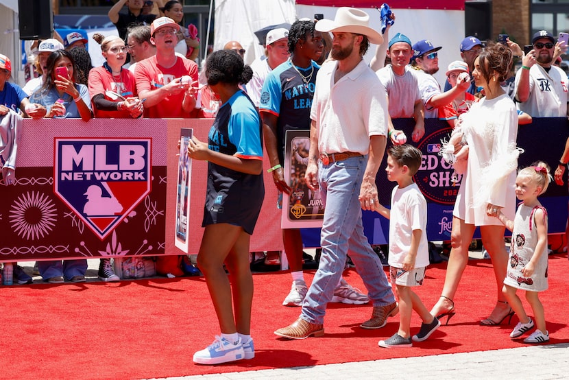 Philadelphia Phillies first baseman Bryce Harper walked with his family during the MLB...