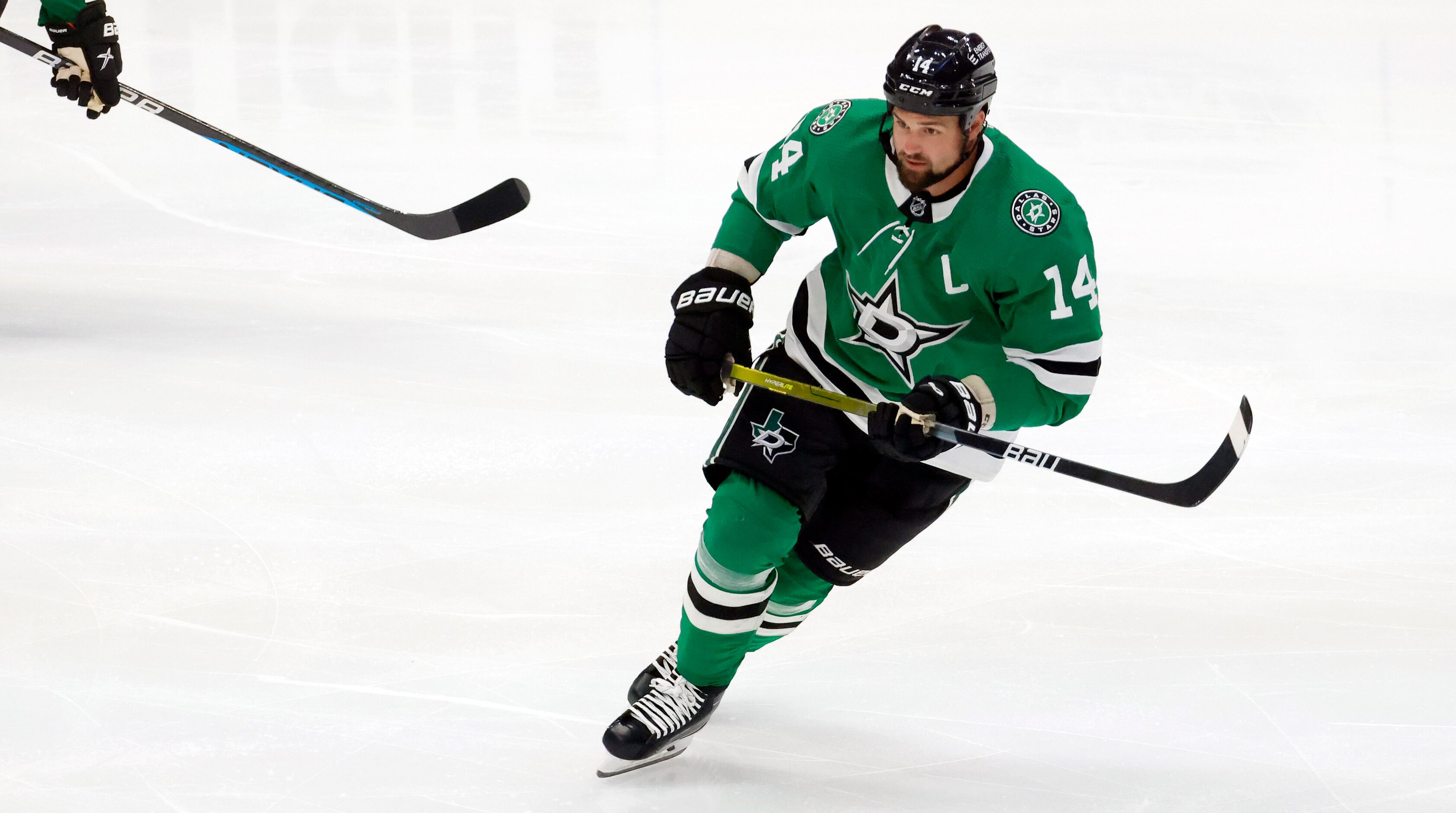 Dallas Stars left wing Jamie Benn (14) skates during the second period against the Anaheim...