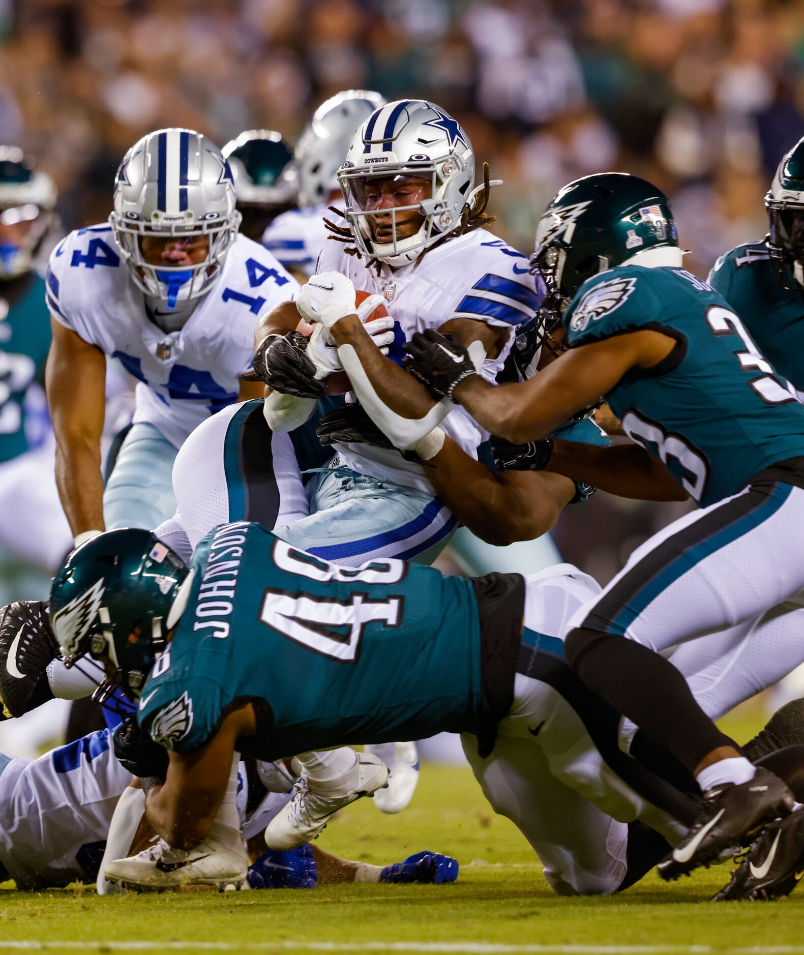 Dallas Cowboys wide receiver KaVontae Turpin (9) is tackled by the Philadelphia Eagles...