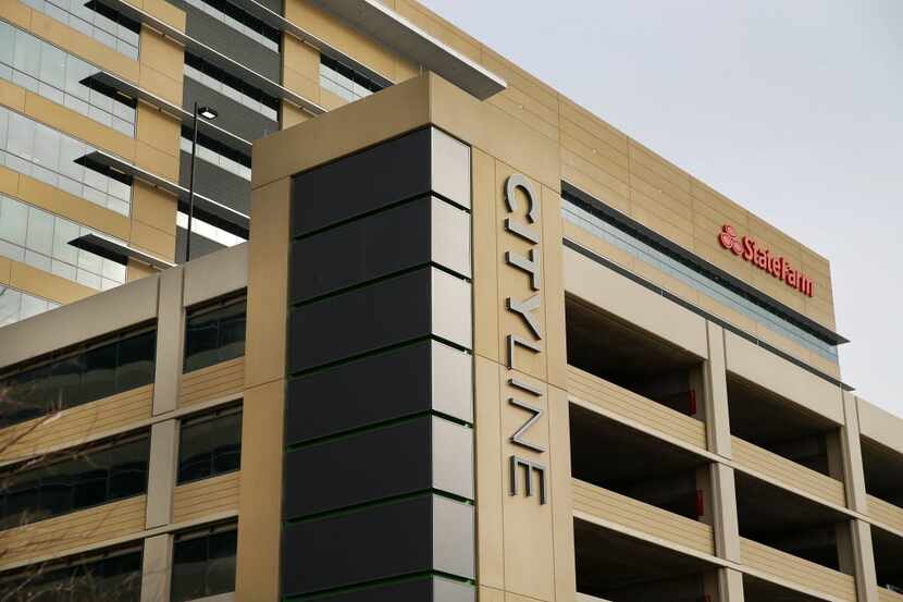 Building One is seen behind a parking garage at State Farm's CityLine Project in Richardson....