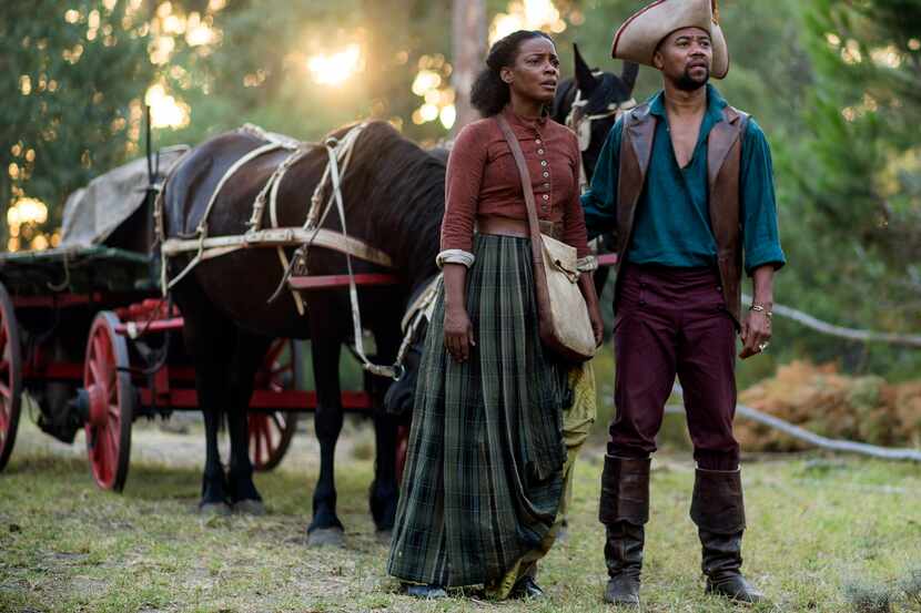 Aunjanue Ellis (left) and Cuba Gooding Jr. star in The Book of Negroes.