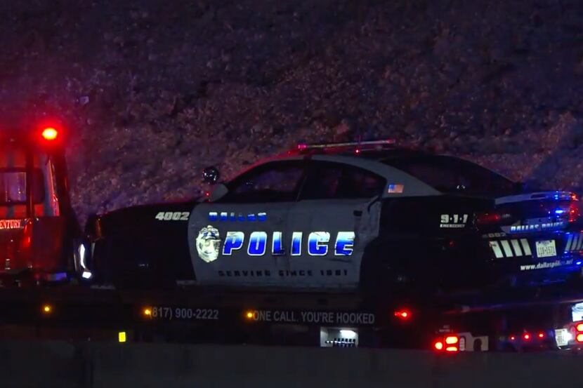 Police are looking for a driver suspected of crashing into a marked Dallas police squad car...