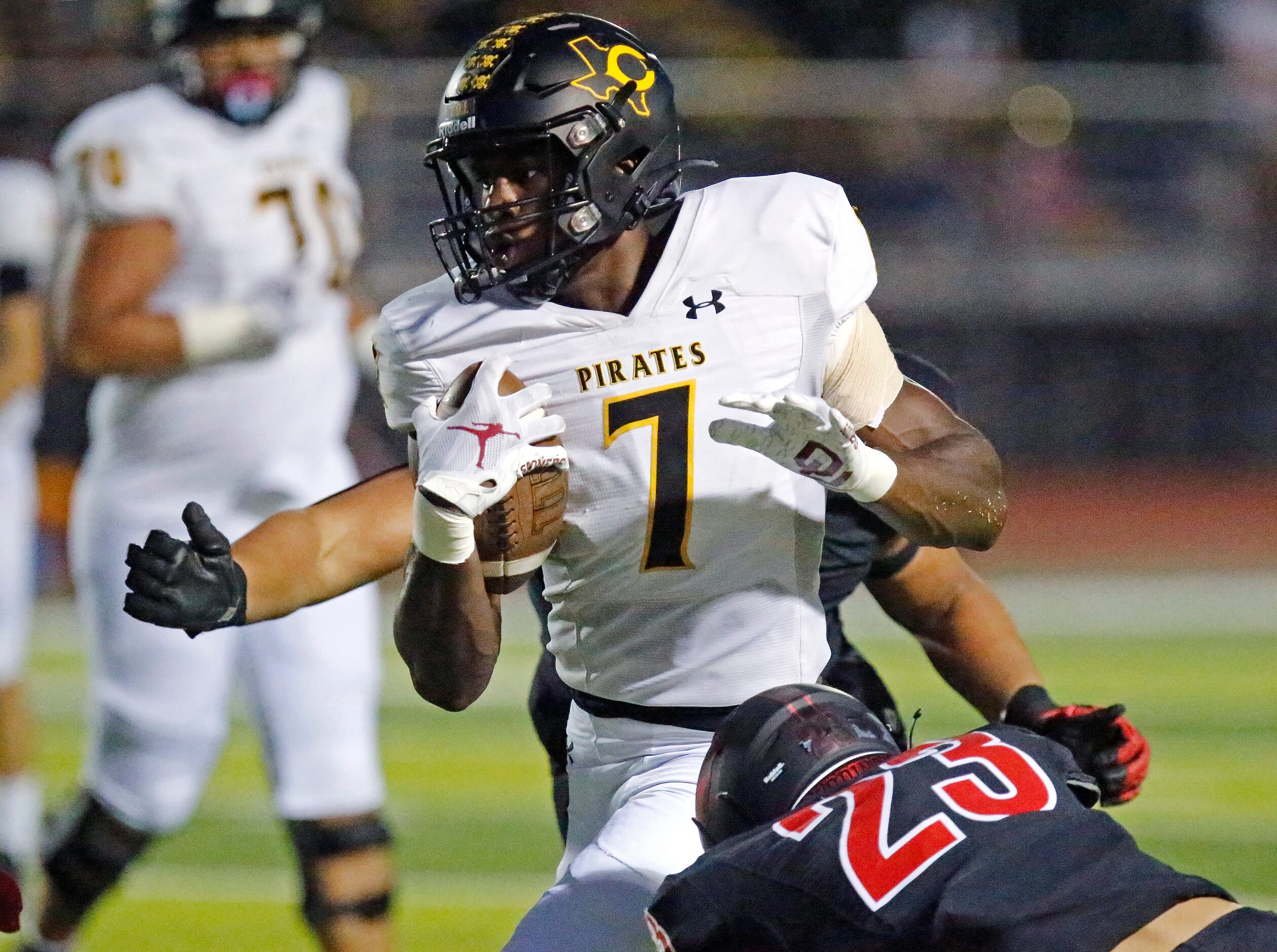 Crandall High School wide receiver Samuel Omosigho (7) breaks a tackle attempt by Melissa...