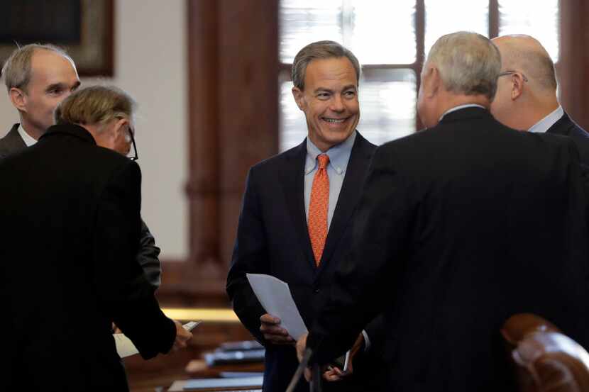 Texas Speaker of the House Joe Straus, R-San Antonio, visits with fellow lawmakers on the...