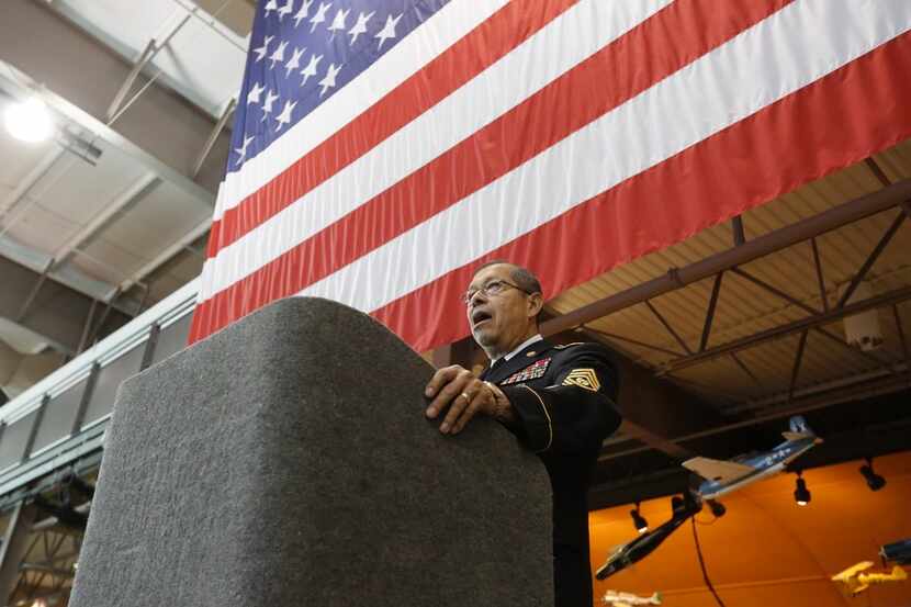 Command Sgt. Maj. Juan Hernandez speaks briefly at the Frontiers of Flight Museum during a...