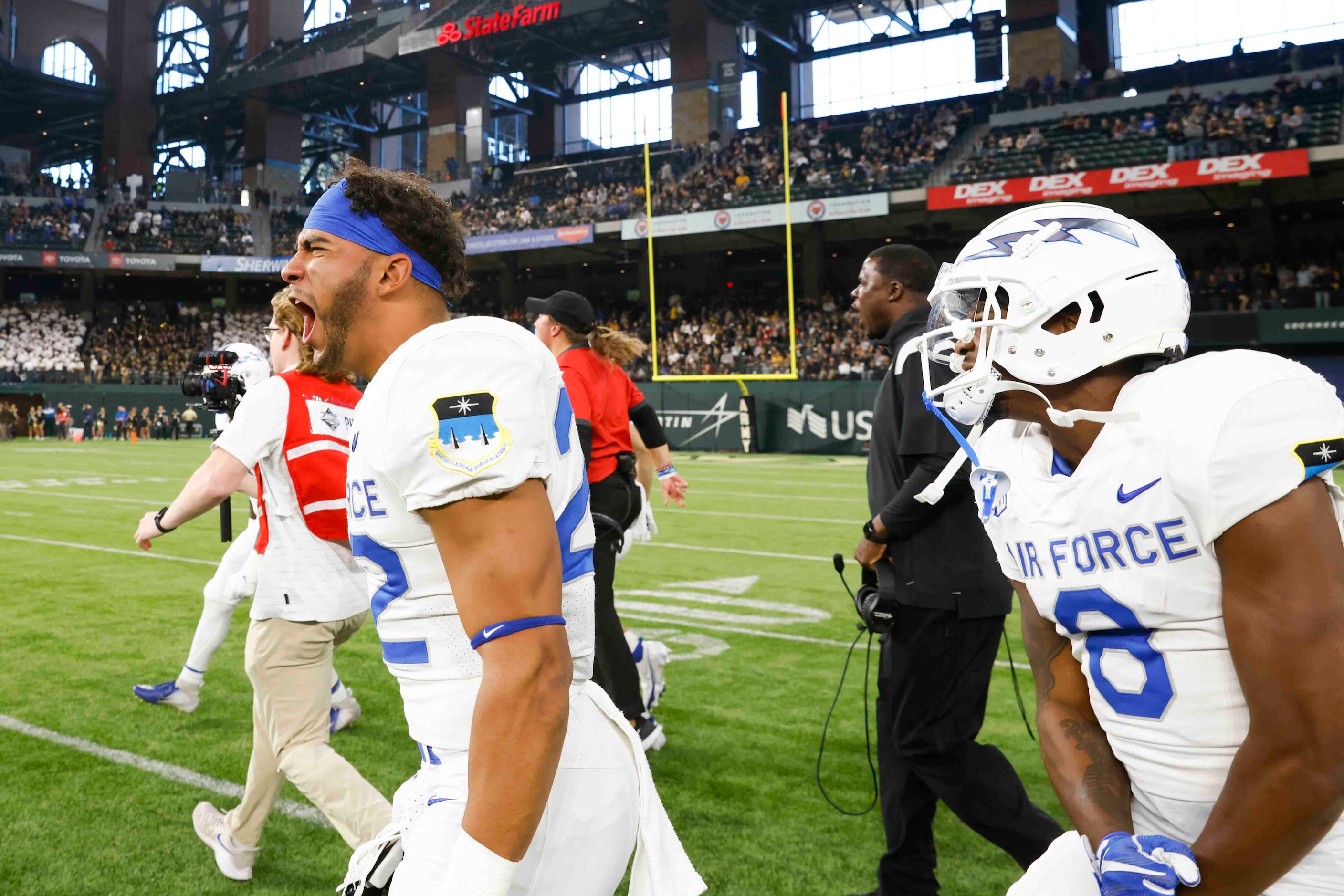 Air Force players celebrate their win against Army during an NCAA football game at Globe...