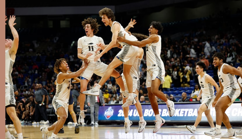 Plano East celebrates after defeating Round Rock Stony Point 53-41 in the UIL Class 6A boys...