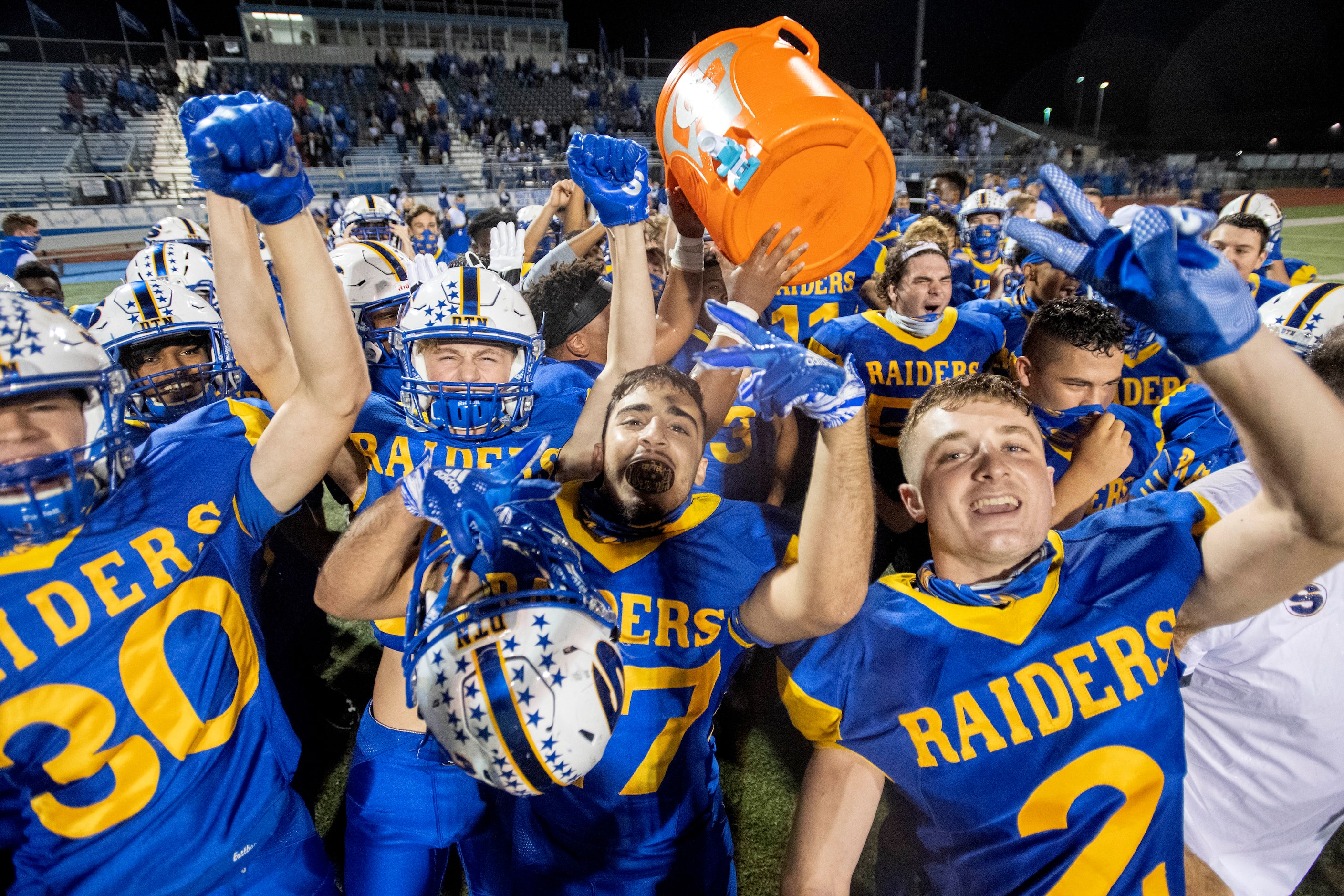 Sunnyvale players Isaiah Sims (30), Kyse Said (27) and Noah McDill (2) celebrate their...