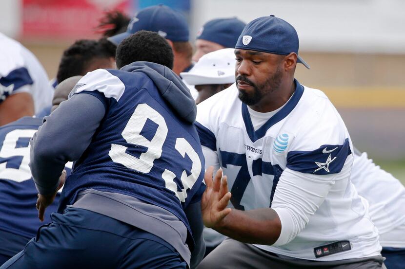 Dallas Cowboys tackle Tyron Smith (77) blocks Dallas Cowboys defensive end Benson Mayowa...