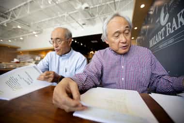 Brothers Ray and Jay Teng look through documents, including letters from then-Sen. Lyndon B....