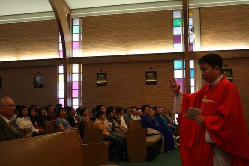 
Fr. Vinh Trinh gives a sermon at Sunday mass at St. Peter Vietnamese Church. 
