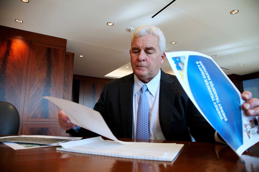 Energy Transfer Partners CEO Kelcy Warren reviews documents at his office in Dallas on...