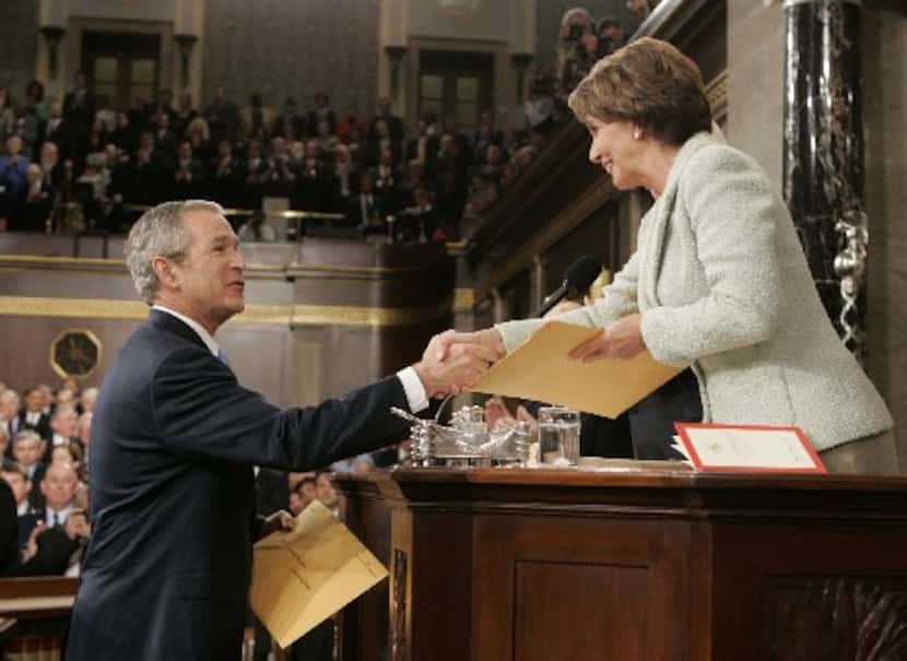 US President George W. Bush greets Speaker of the House Nancy Pelosi during the 2007 State...
