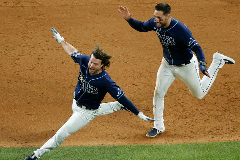 Tampa Bay Rays Brett Phillips (14) and Tampa Bay Rays center fielder Kevin Kiermaier (39...