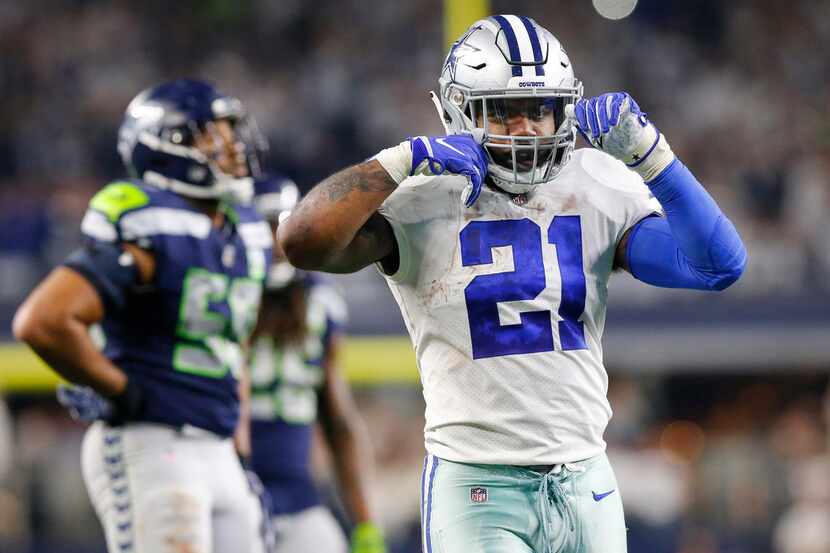 Dallas Cowboys running back Ezekiel Elliott (21) gives the 'double spooning' motion after a...