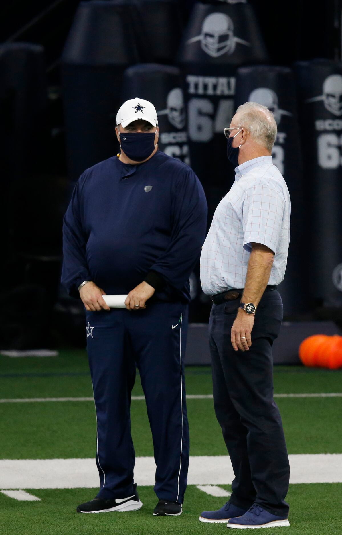 Dallas Cowboys head coach Mike McCarthy talks with Dallas Cowboys executive vice president...