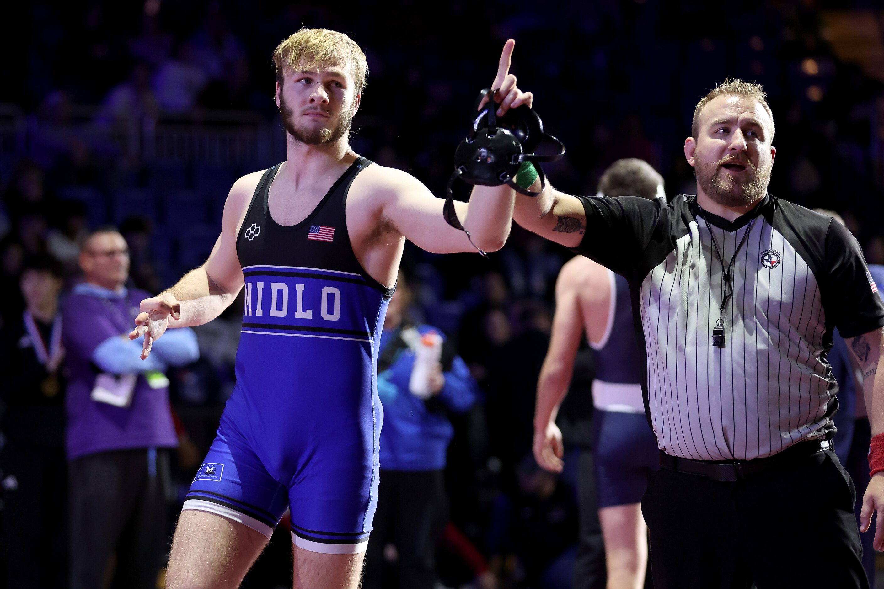 Karson Tompkins of Midlothian celebrates after defeating Nicholas Dudzikowski of Comal...