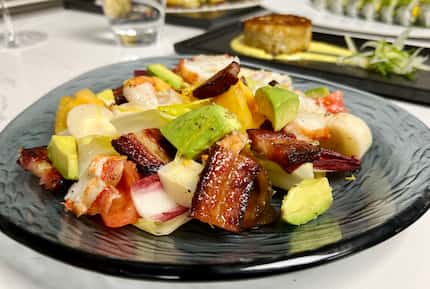 The BLT salad at Crown Block swaps the lettuce for lobster. So it's bacon, lobster and...