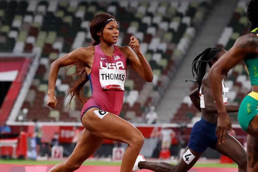 USA’s Gabrielle Thomas competes in the women’s 200 meter semifinal during the postponed 2020...