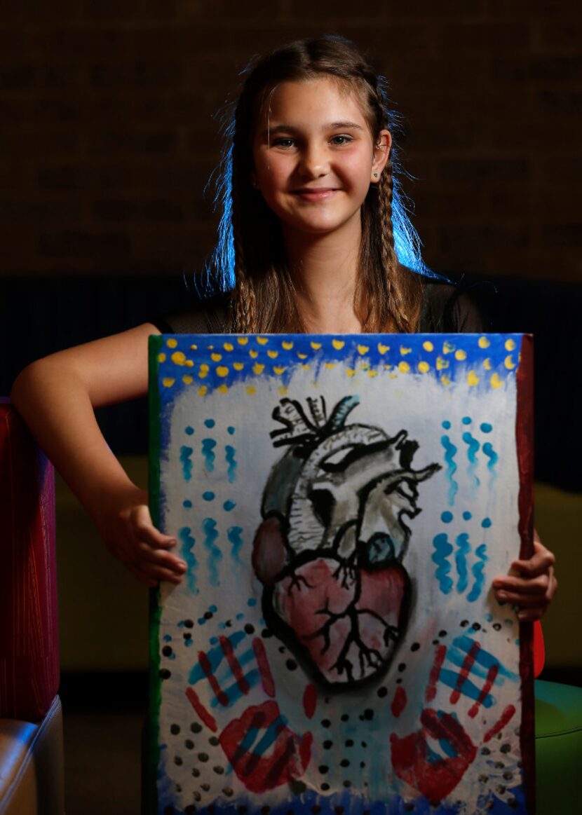 At a follow-up visit to scoliosis surgery, Alexis Brown poses at Texas Scottish Rite...