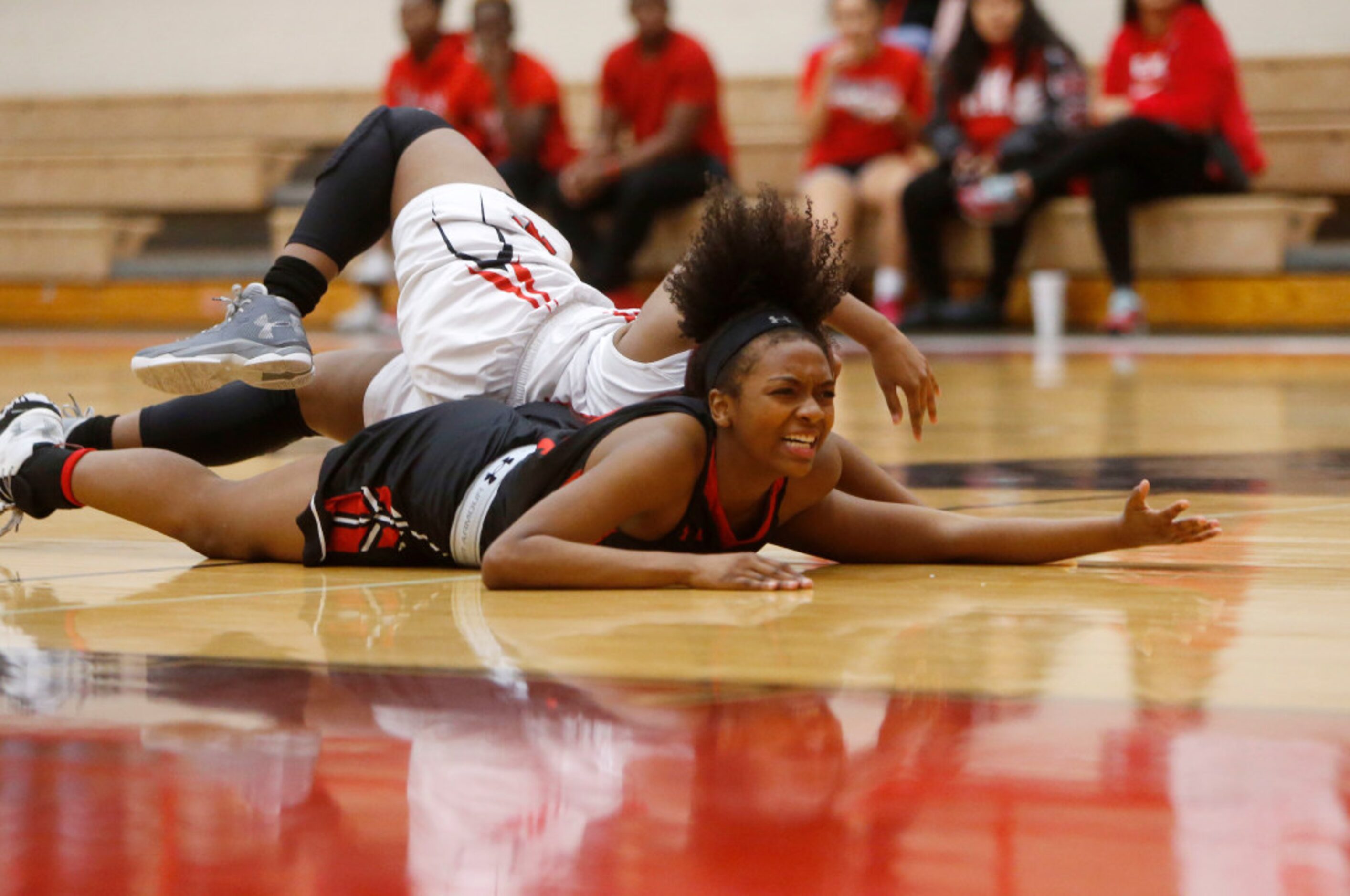 South Grand Prairie player Diamond Willcot (24) loses the ball against Cedar Hill guard...