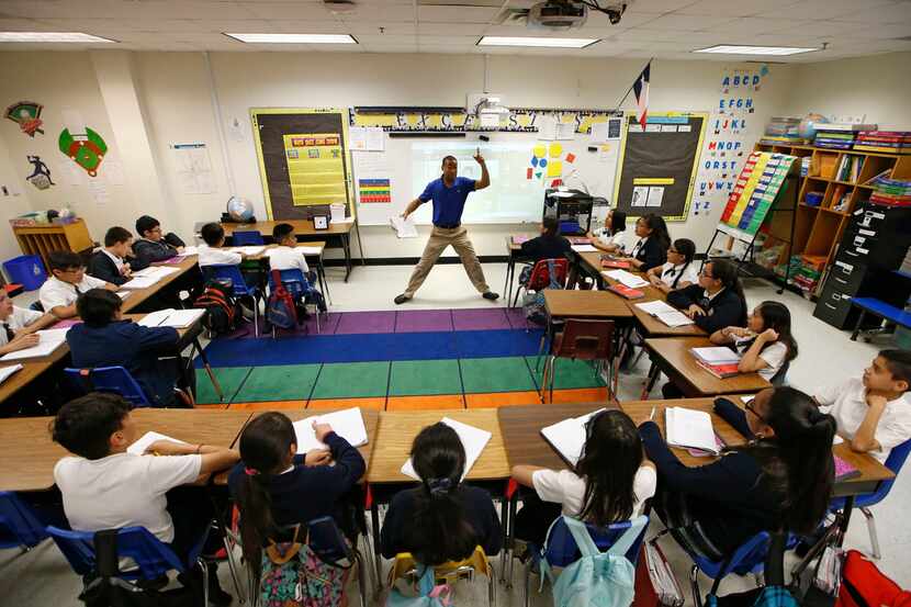 Josue Tamarez Torres teaches his fifth-grade bilingual class at Annie Webb Blanton...