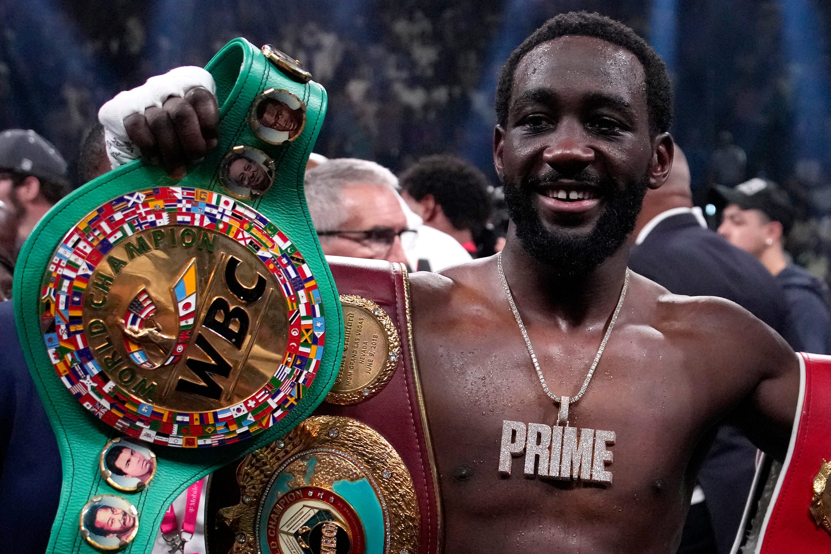 Terence Crawford celebrates his defeat of Errol Spence Jr. after their undisputed...