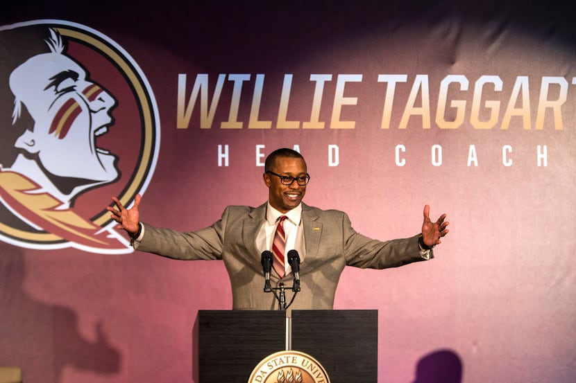 Willie Taggart gestures as he is introduced as Florida State's new football coach during an...