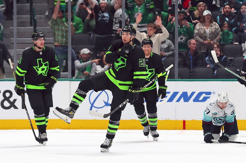 Dallas Stars left wing Jason Robertson (21) celebrates a goal against the Seattle Kraken...