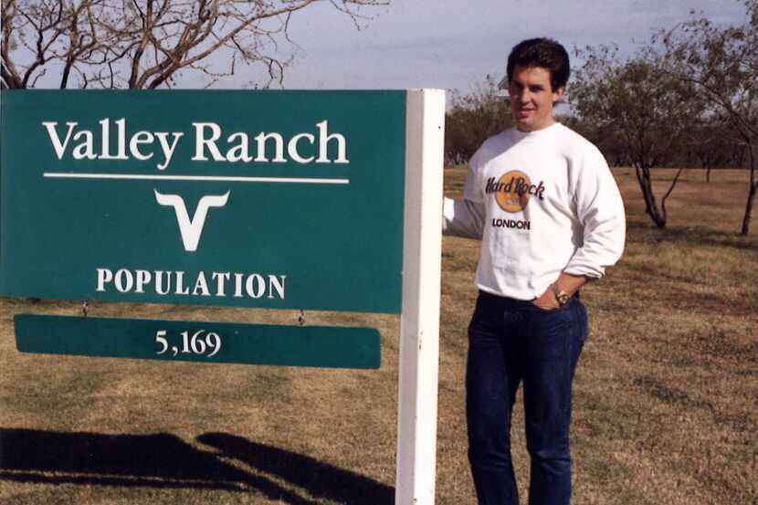 Tim Cowlishaw in front of the Valley Ranch community sign, in Irving, Texas, in 1986. The...