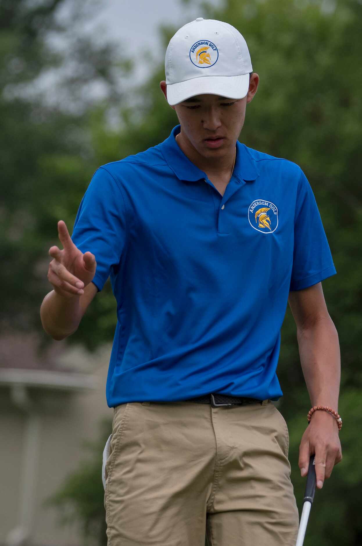 Austin Anderson Keaton Vot waves to the gallery after sinking a birdie putt on the no.1...