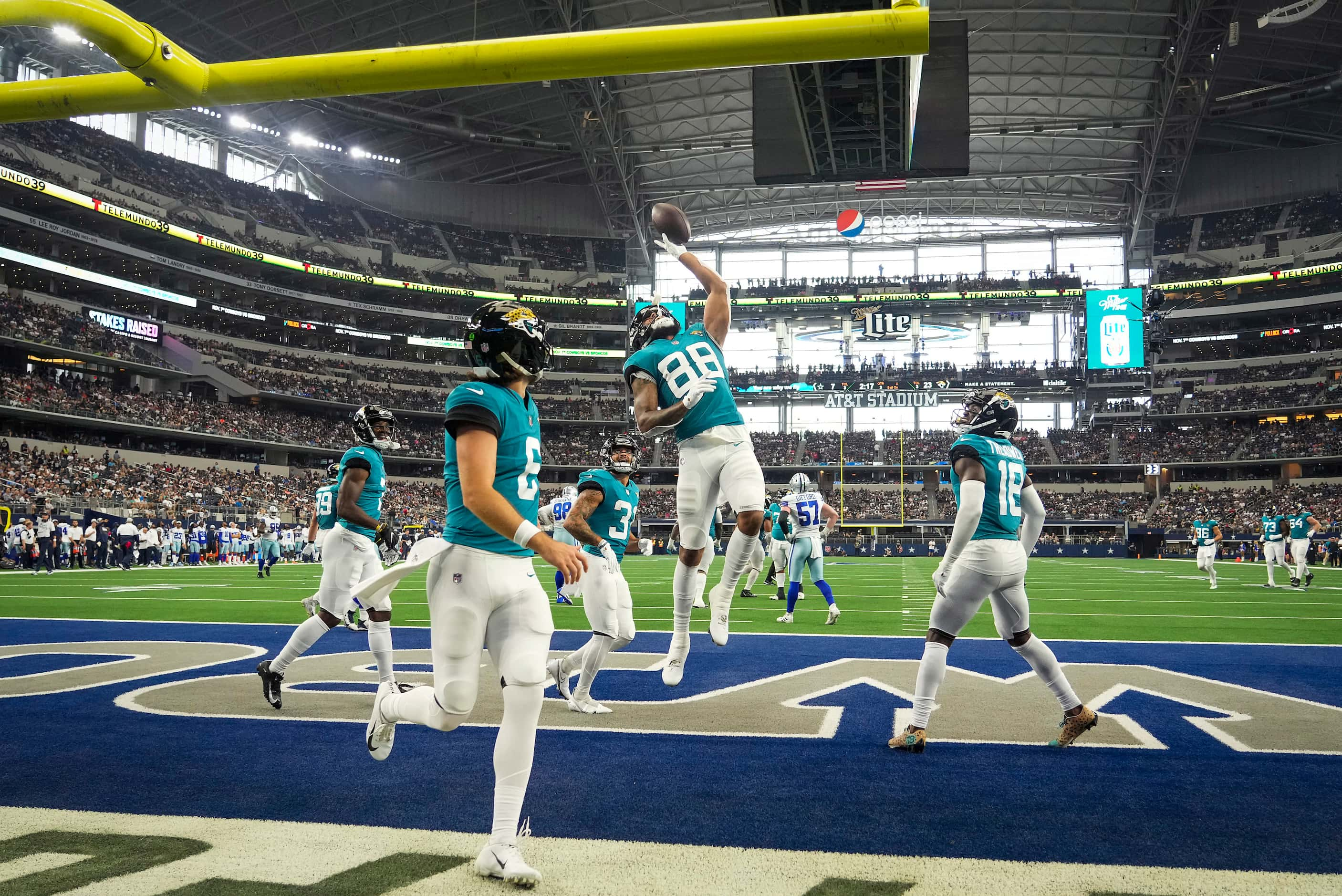 Jacksonville Jaguars wide receiver Jeff Cotton, Jr. (88), celebrates after a touchdown by...